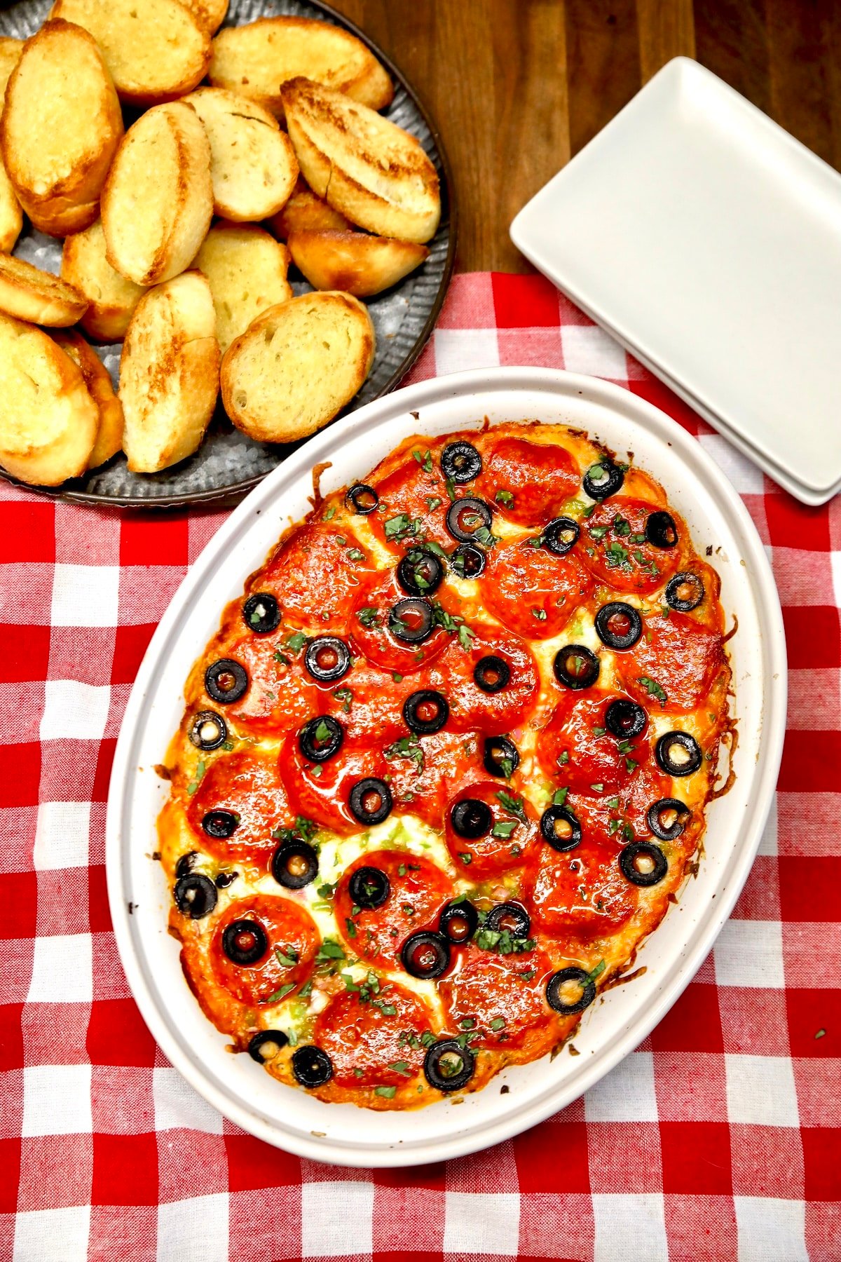 Dip in a casserole dish with toasted baguette.