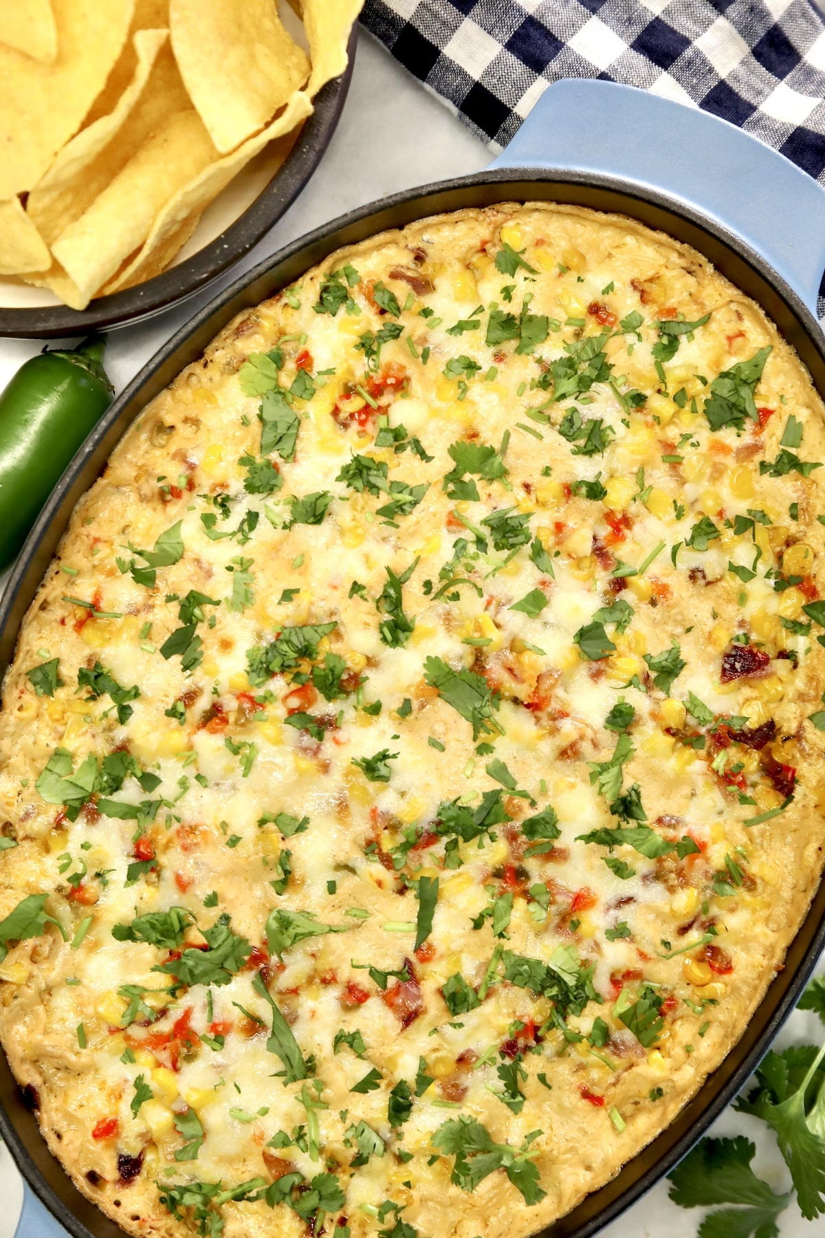 Oval casserole with cheesy appetizer dip.