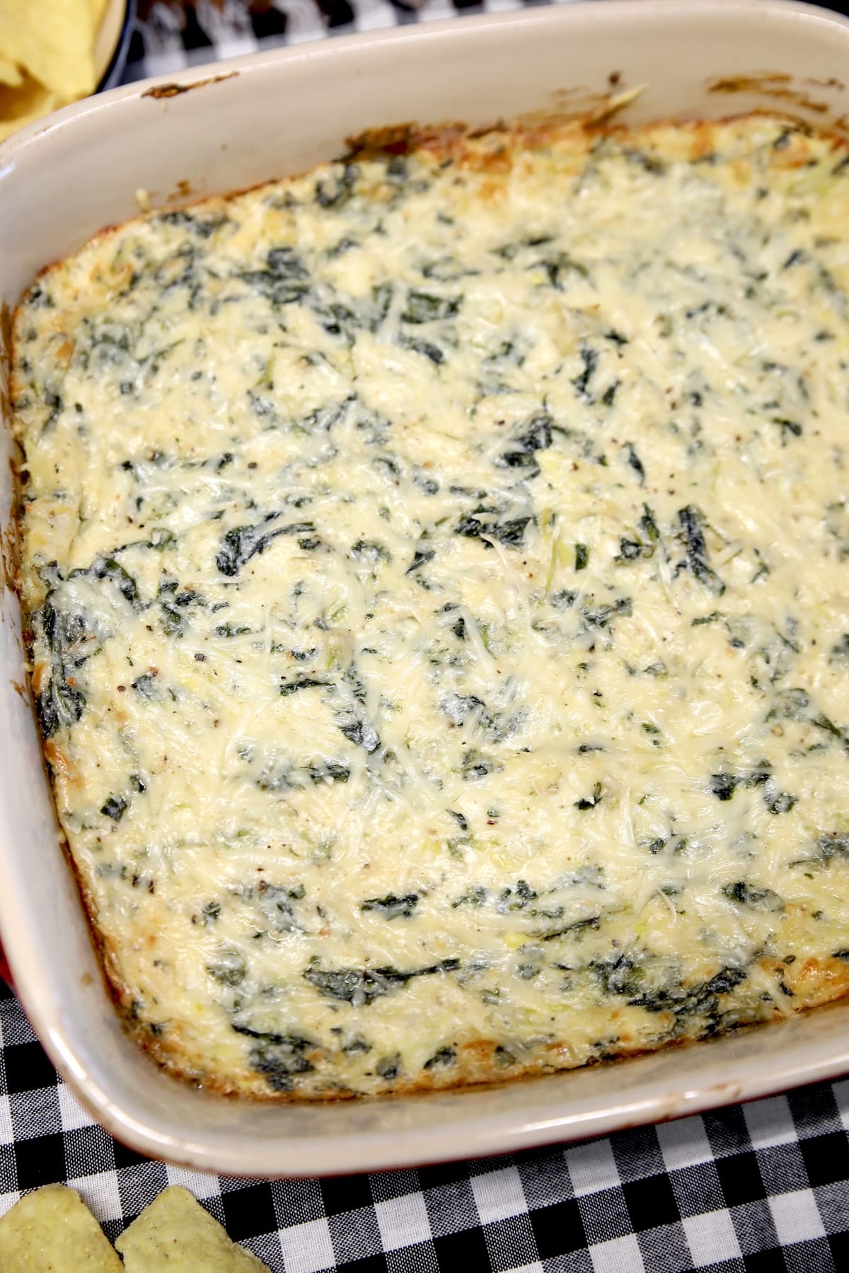 Warm dip in a square casserole dish.