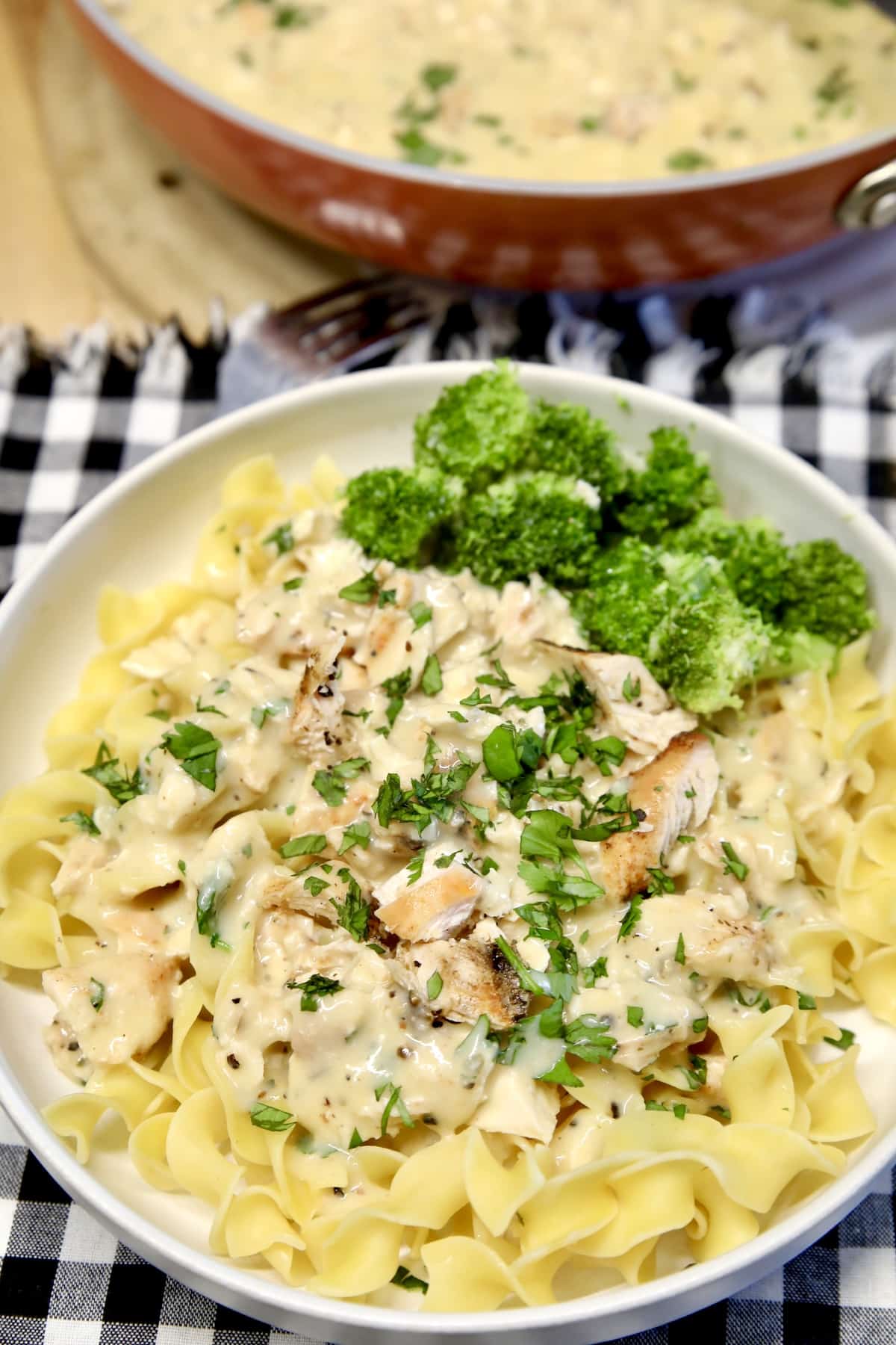 Creamy chicken and noodles in a bowl.