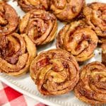 Bacon croissant muffins on a platter.