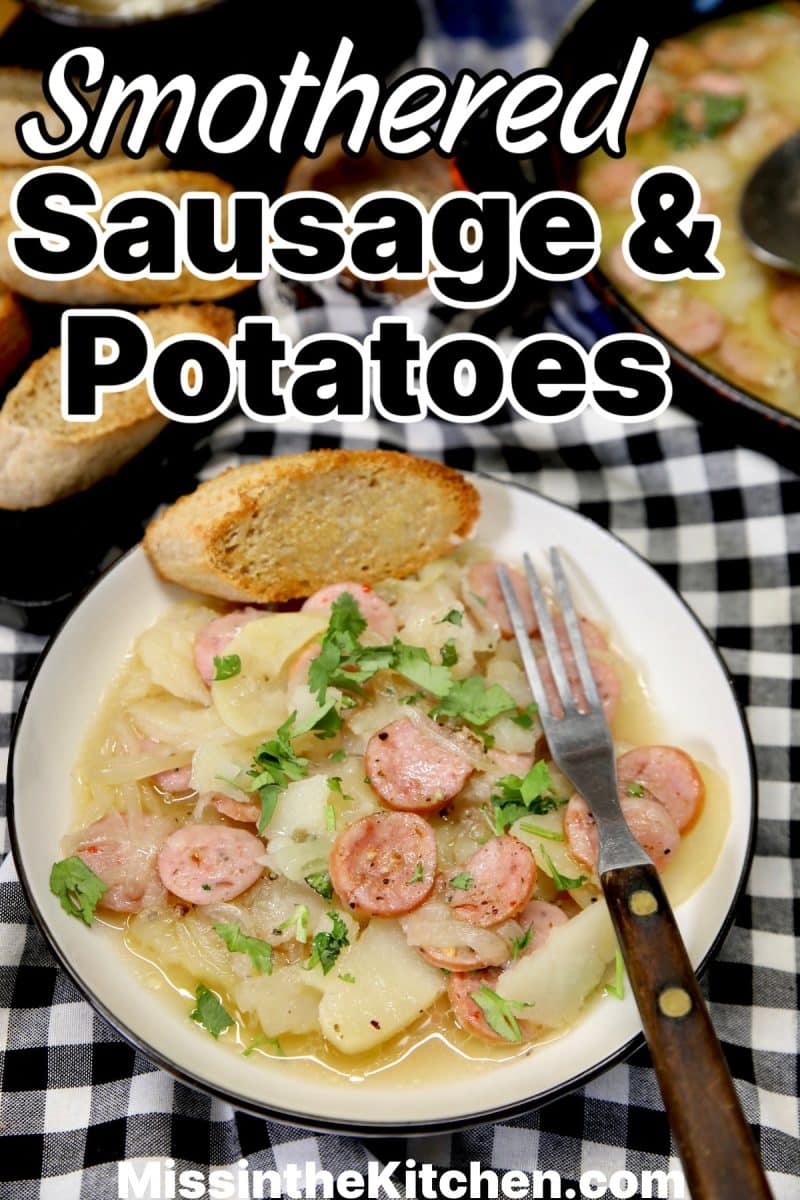 Smothered potatoes with smoked sausage on a plate - text overlay.
