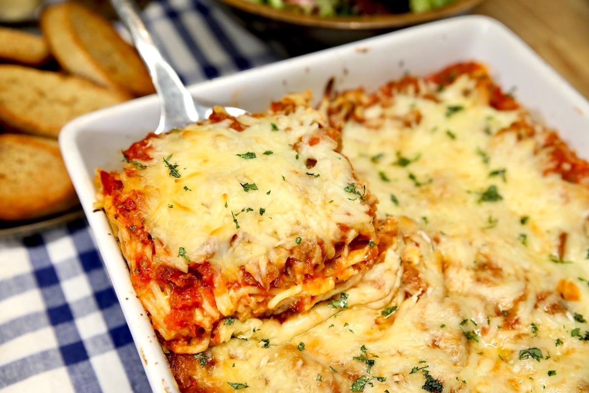 Baked spaghetti on a spatula.