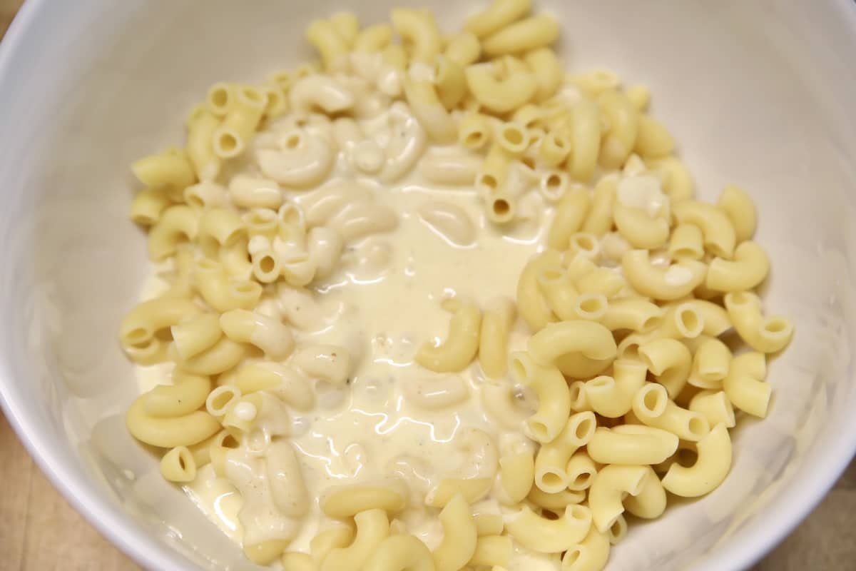 Macaroni with creamy dressing in a bowl.