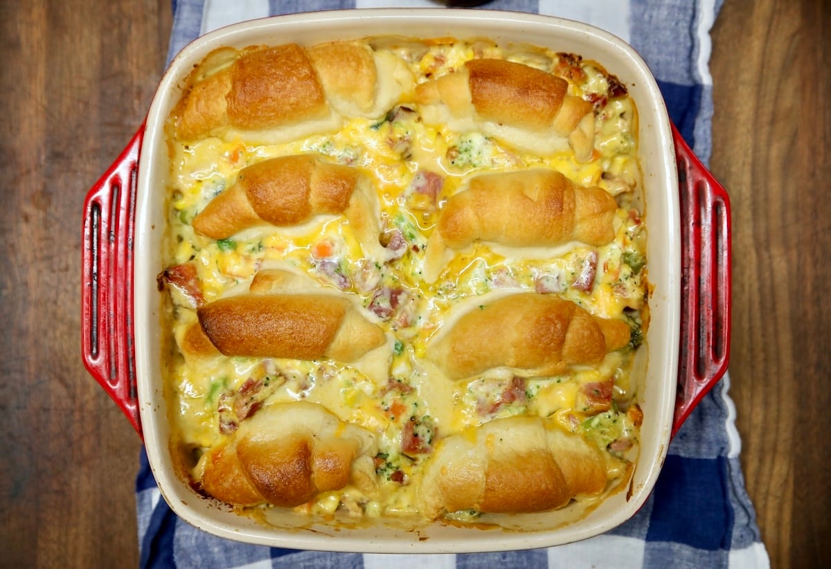 Ham and cheese pot pie casserole. Casserole with crescent rolls on top.