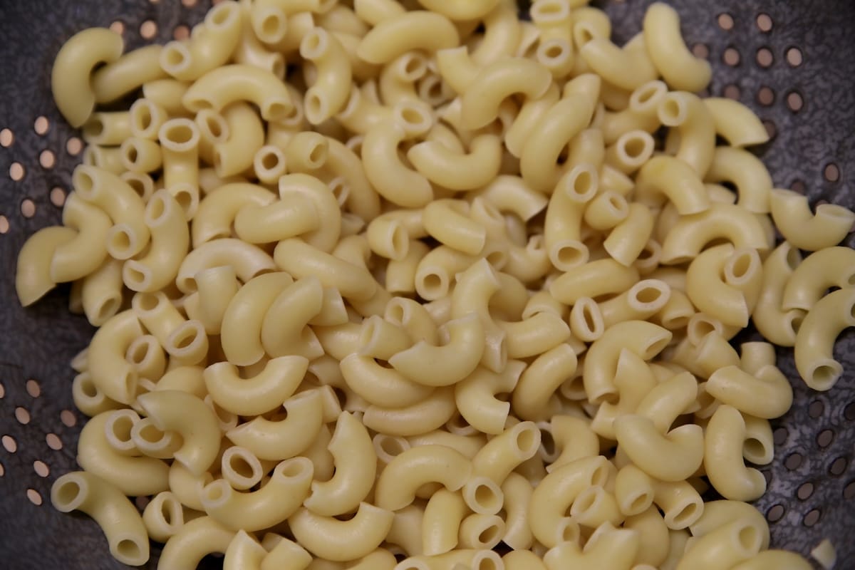 Macaroni in a colander.