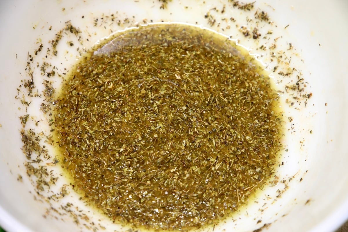 Dressing for salad mixed in a bowl.