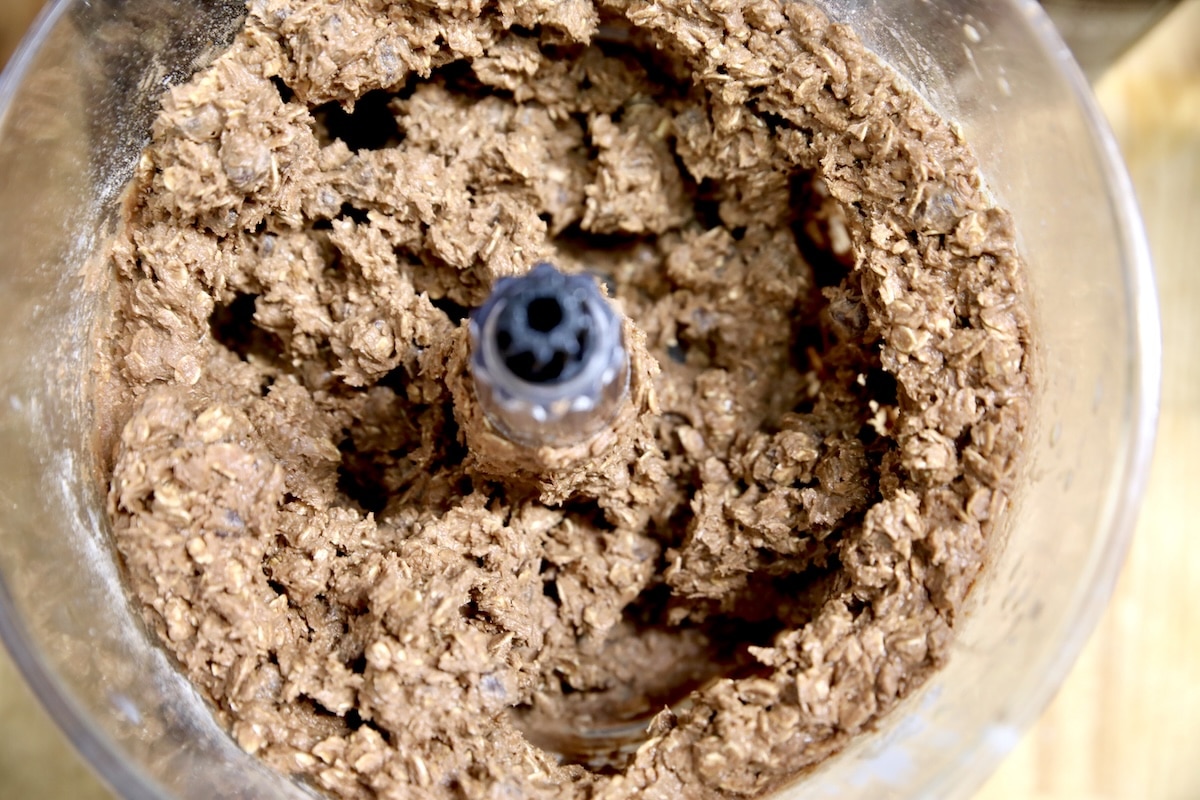 Chocolate oatmeal cookie dough in mixing bowl.