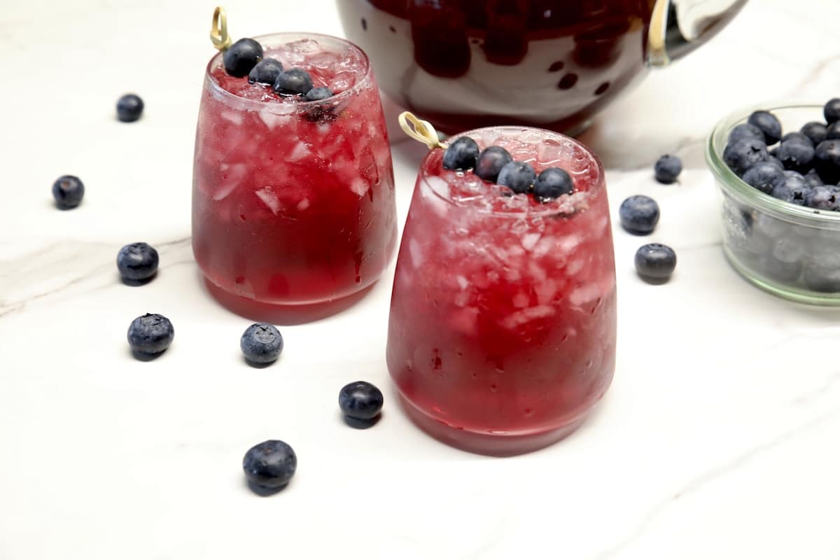 2 glasses with blueberry punch.