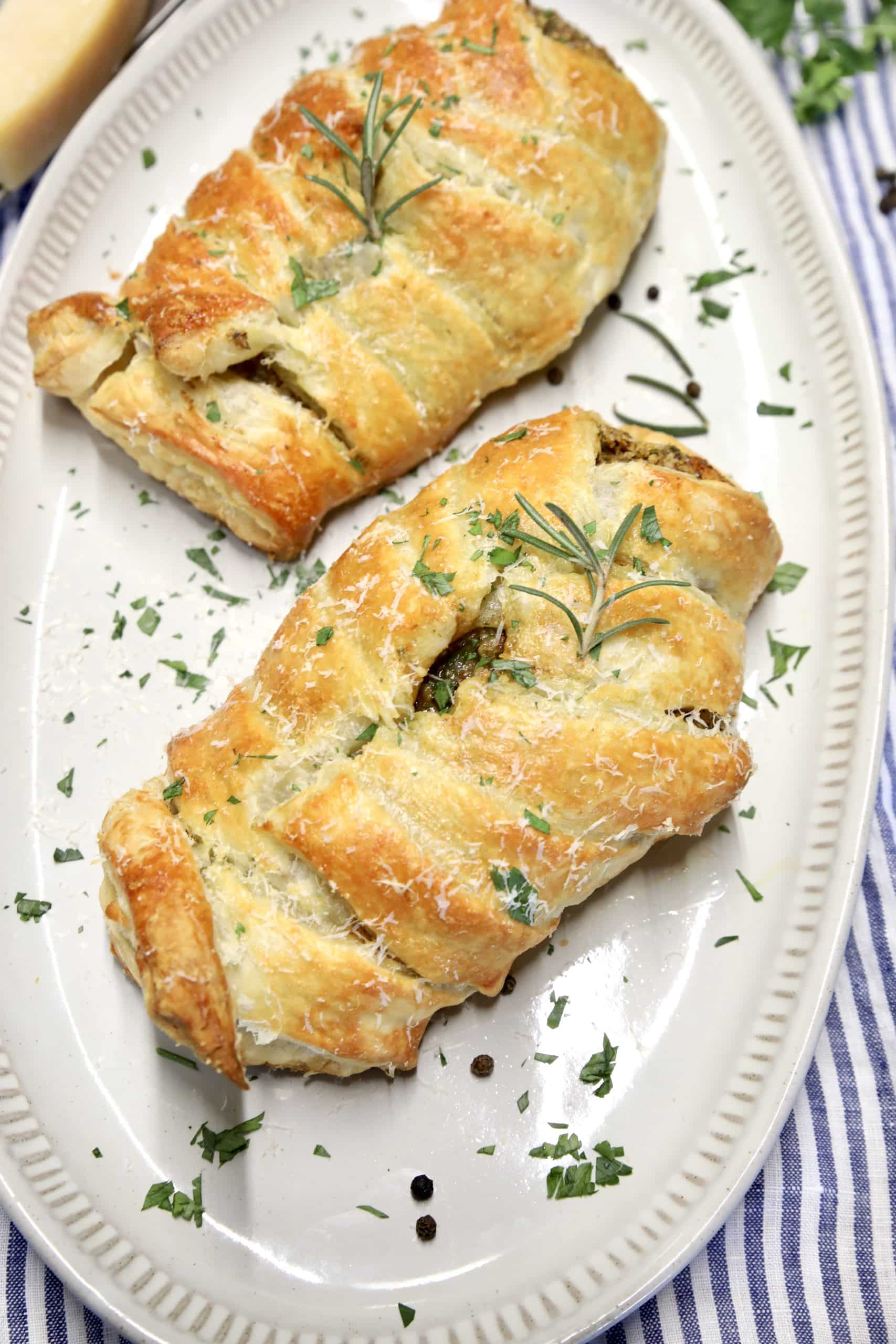 Puff pastry chicken on a platter.
