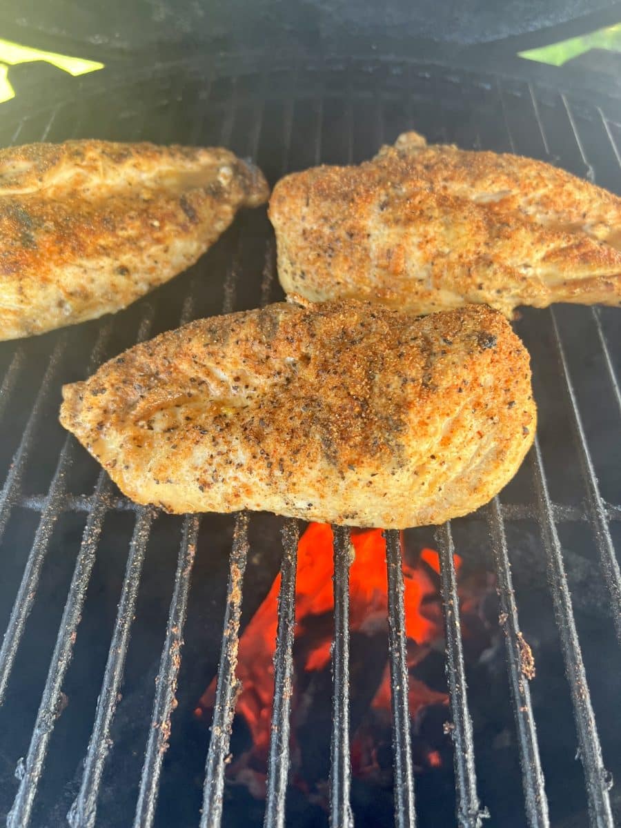 Grilling chicken breasts.