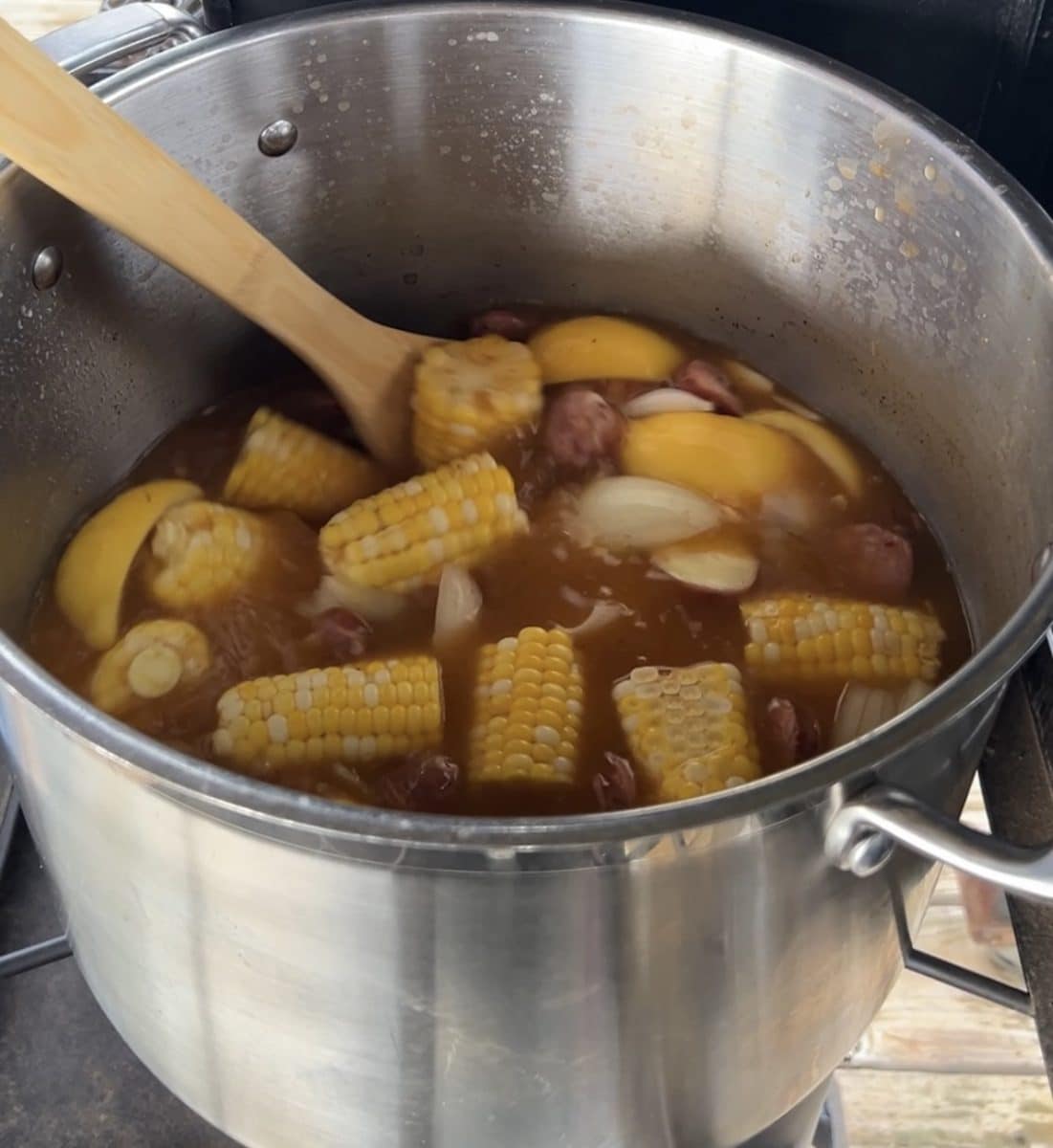 Corn on the cob pieces in seafood boil.