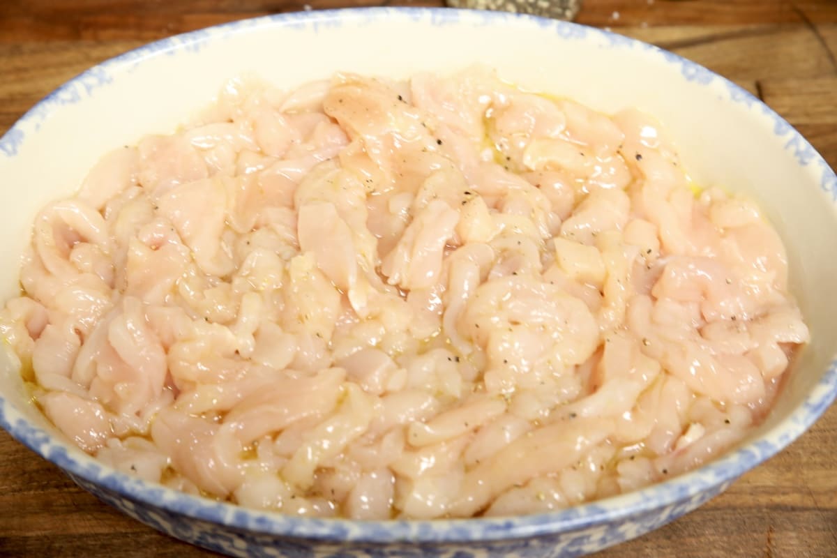 Thin sliced chicken breast with olive oil, salt and pepper.