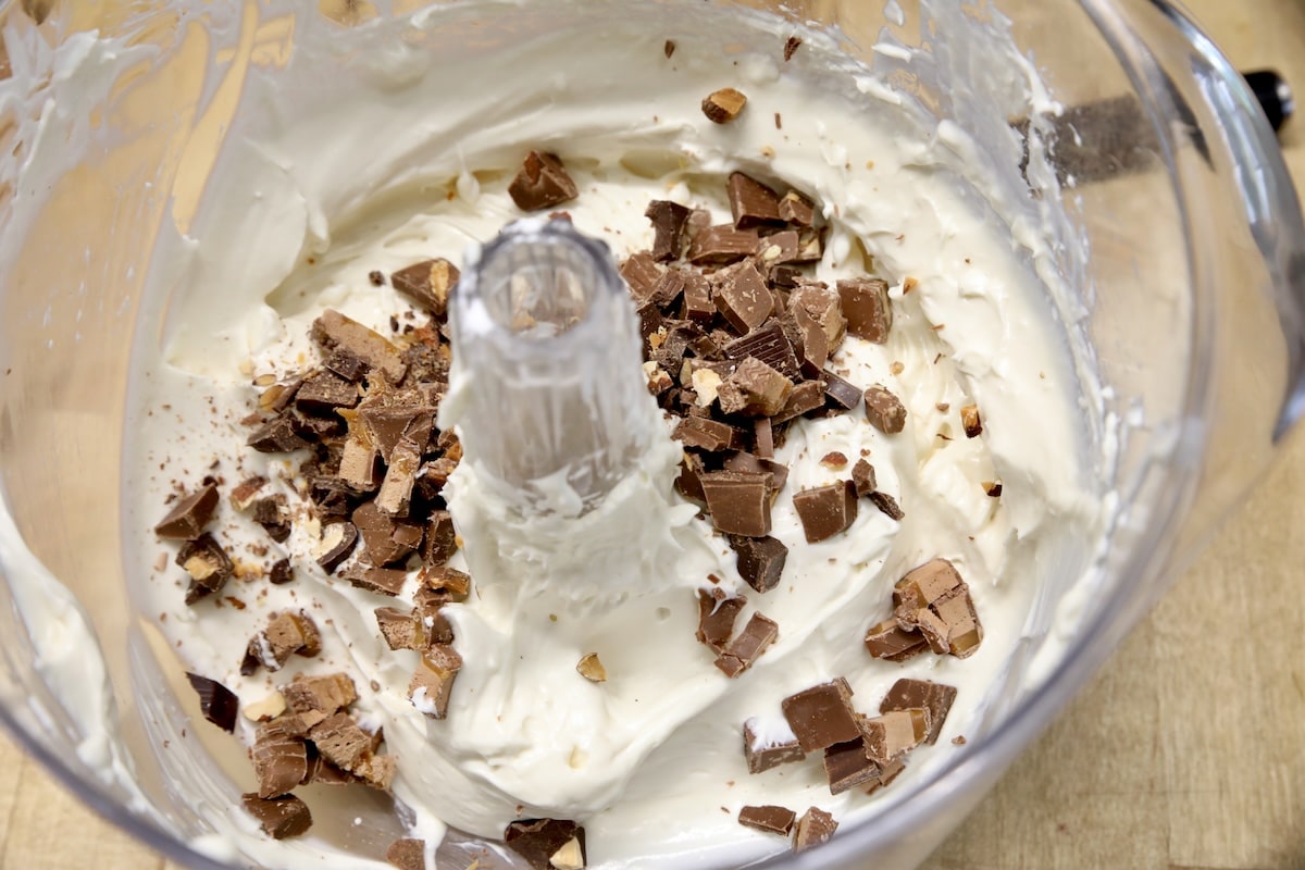 Cheesecake filling with chopped chocolate candy bars.