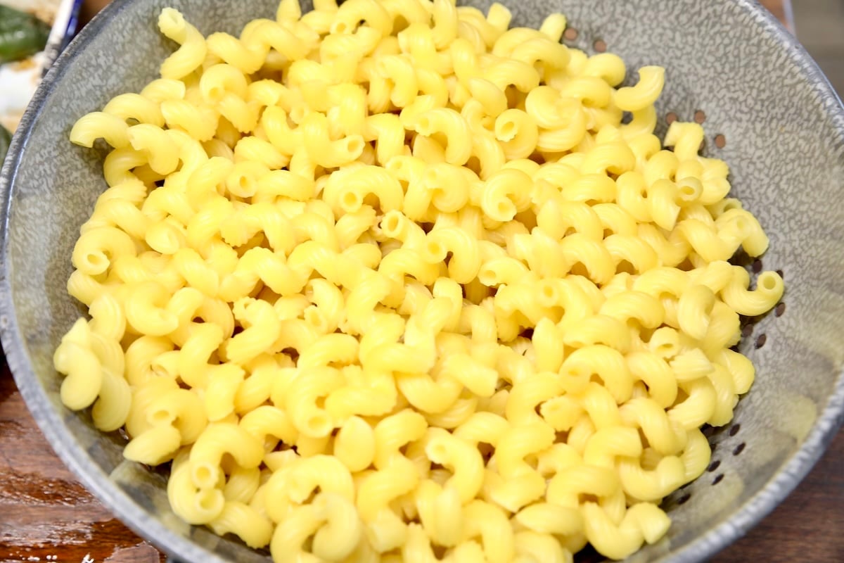 Colander of macaroni - cooked.