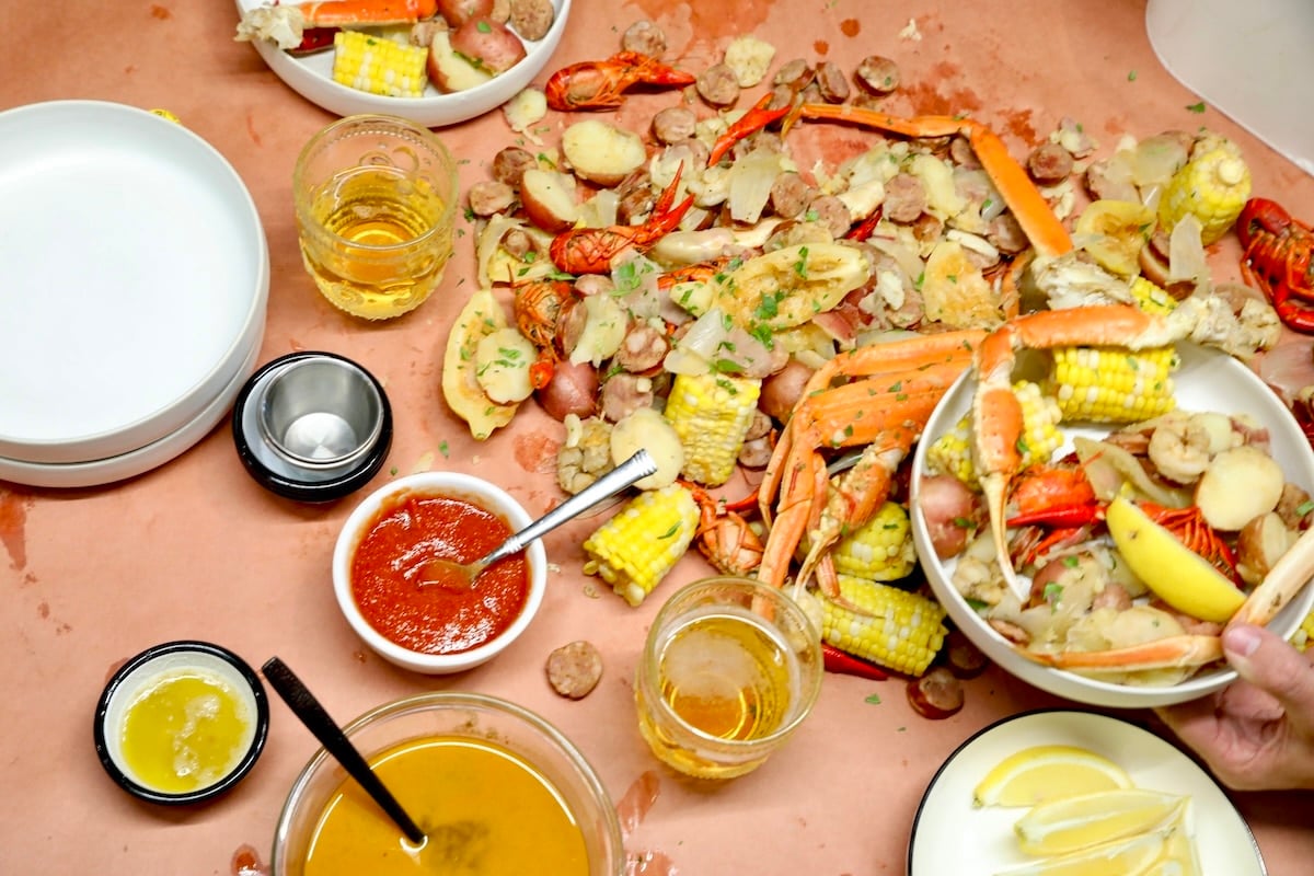 Seafood boil on pink butcher paper.