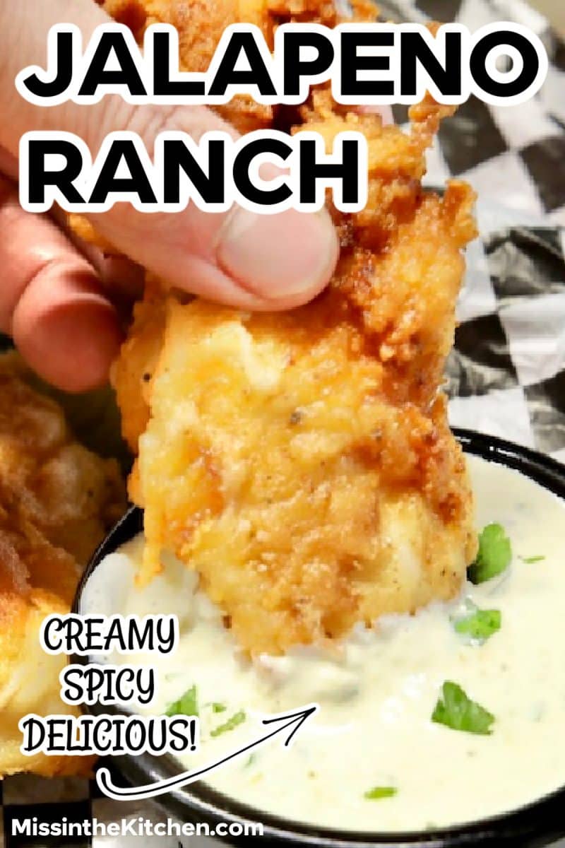 Chicken tender dipping into jalapeno ranch sauce - text overlay.