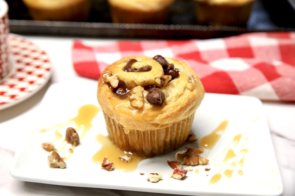 Caramel pecan cruffin on a plate.