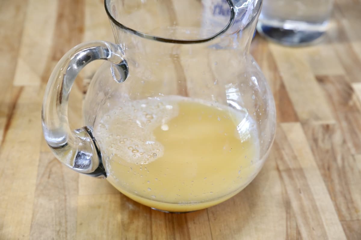 Pitcher with lemon juice.