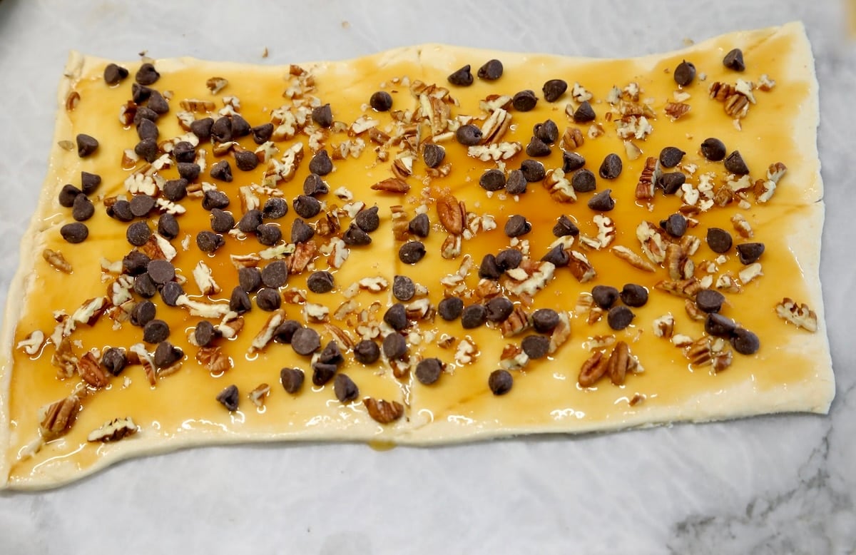 Crescent dough with caramel, pecans, chocolate chips.
