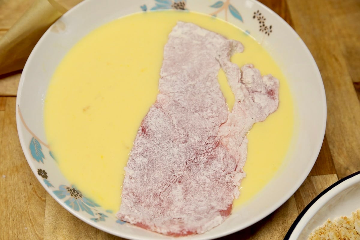 Egg and milk batter with pork chop.
