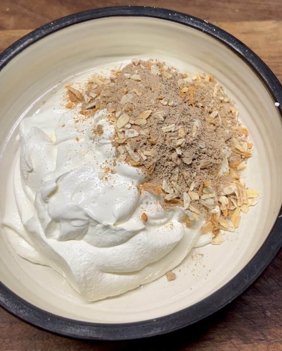 Onion soup mix in a bowl with sour cream.