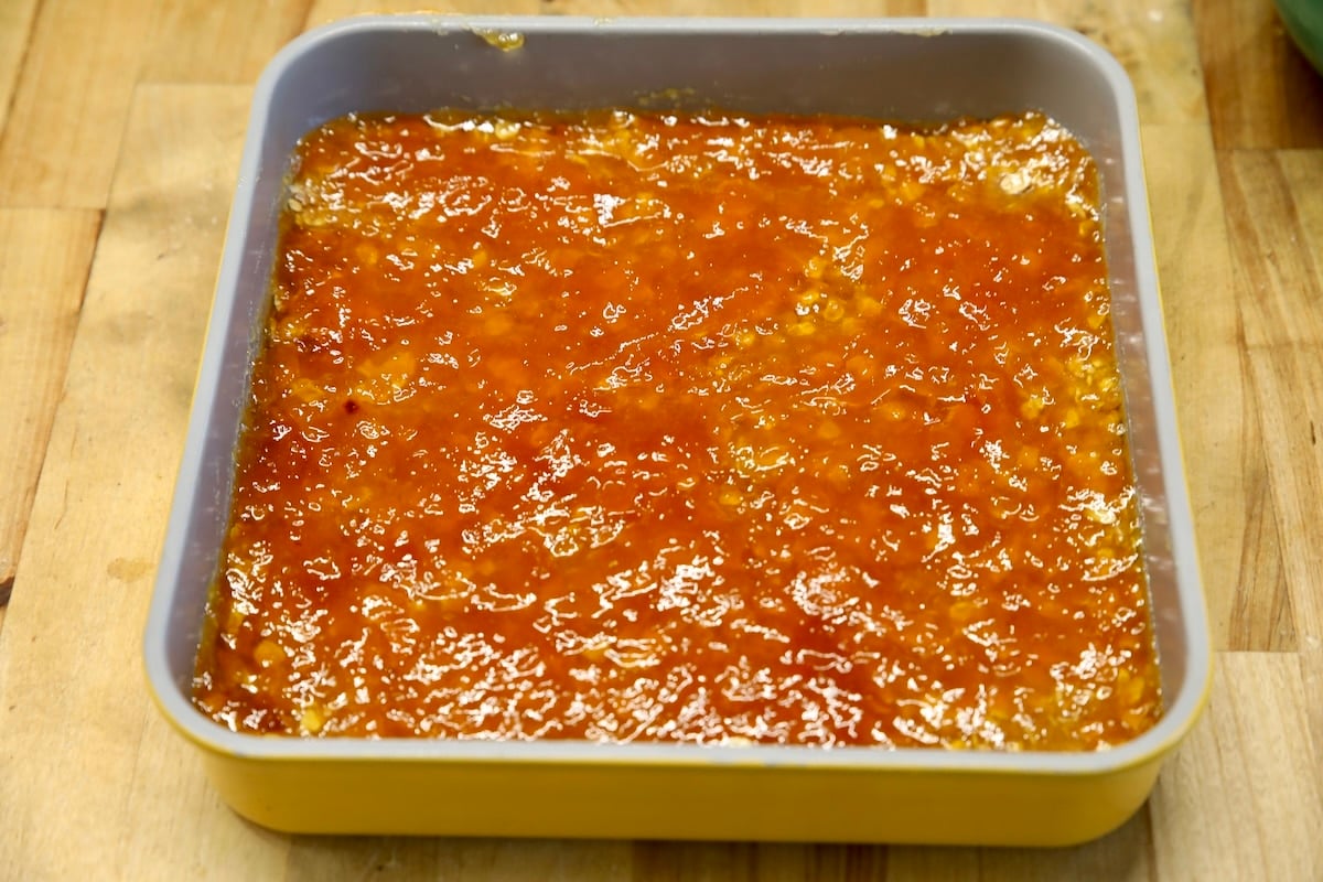 Peach preserves over oatmeal crust.
