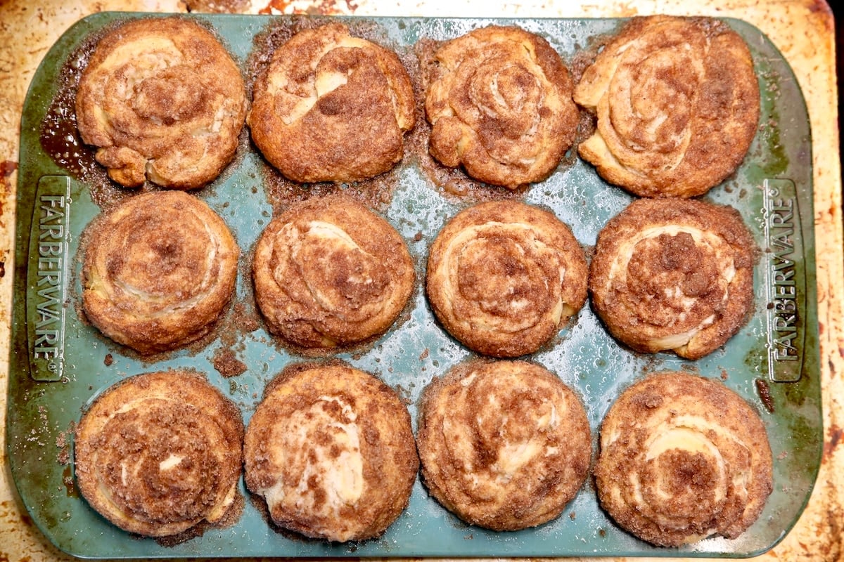 Baked cruffins in a muffin pan.