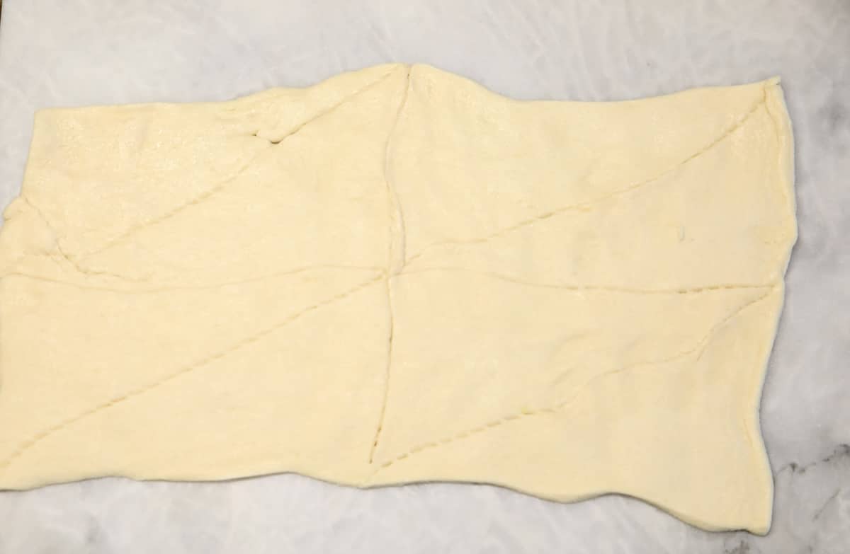 Crescent Dough spread into a rectangle.