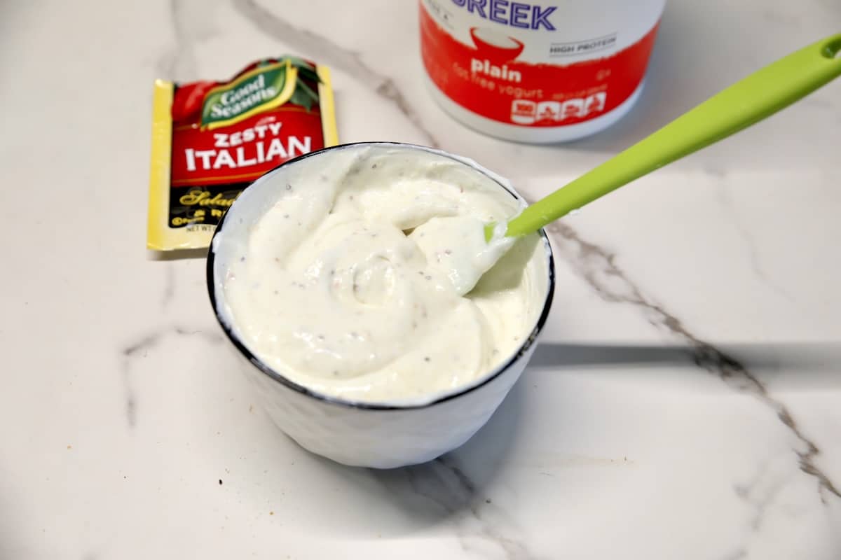 Making veggie dip with greek yogurt and Italian dressing mix. 