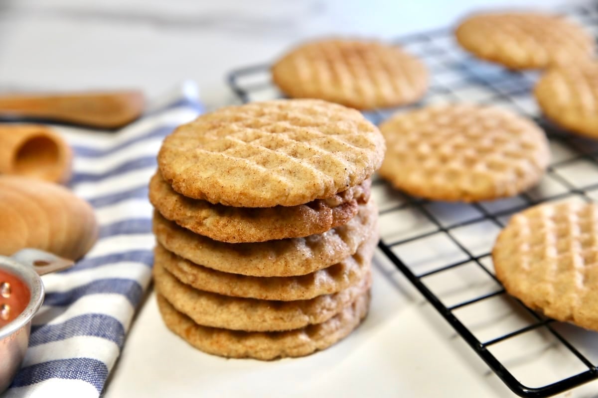 Brown sugar cinnamon cookies for fall and winter. Stack of cookies, cookies on wire rack.