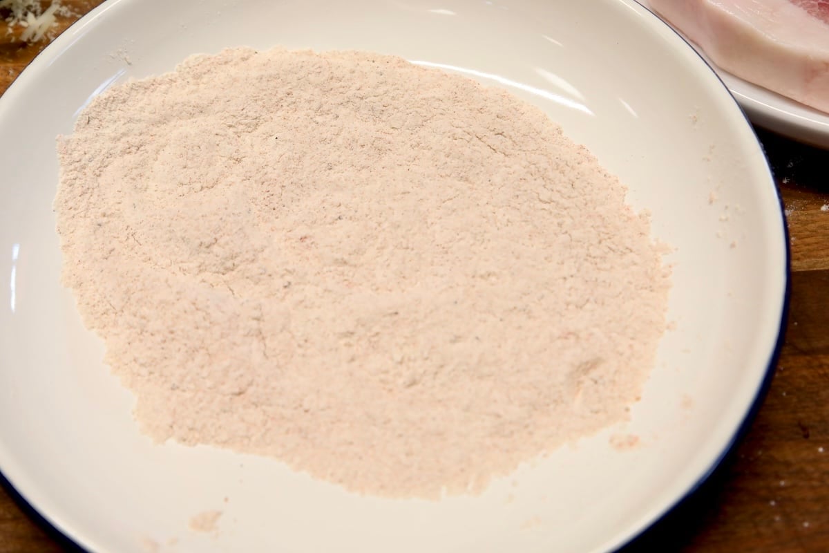 Seasoned flour in a bowl.