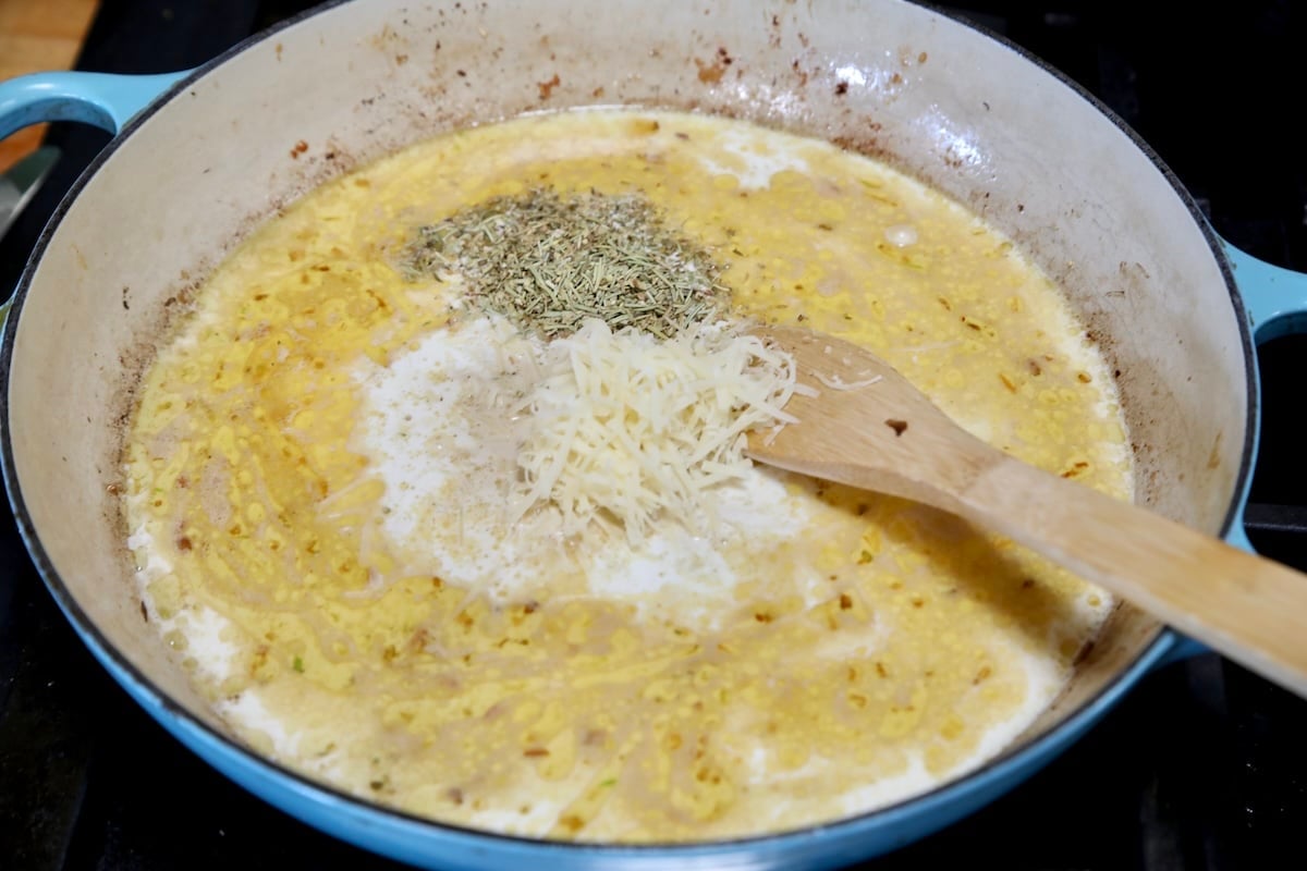 Making cream sauce in a pan.
