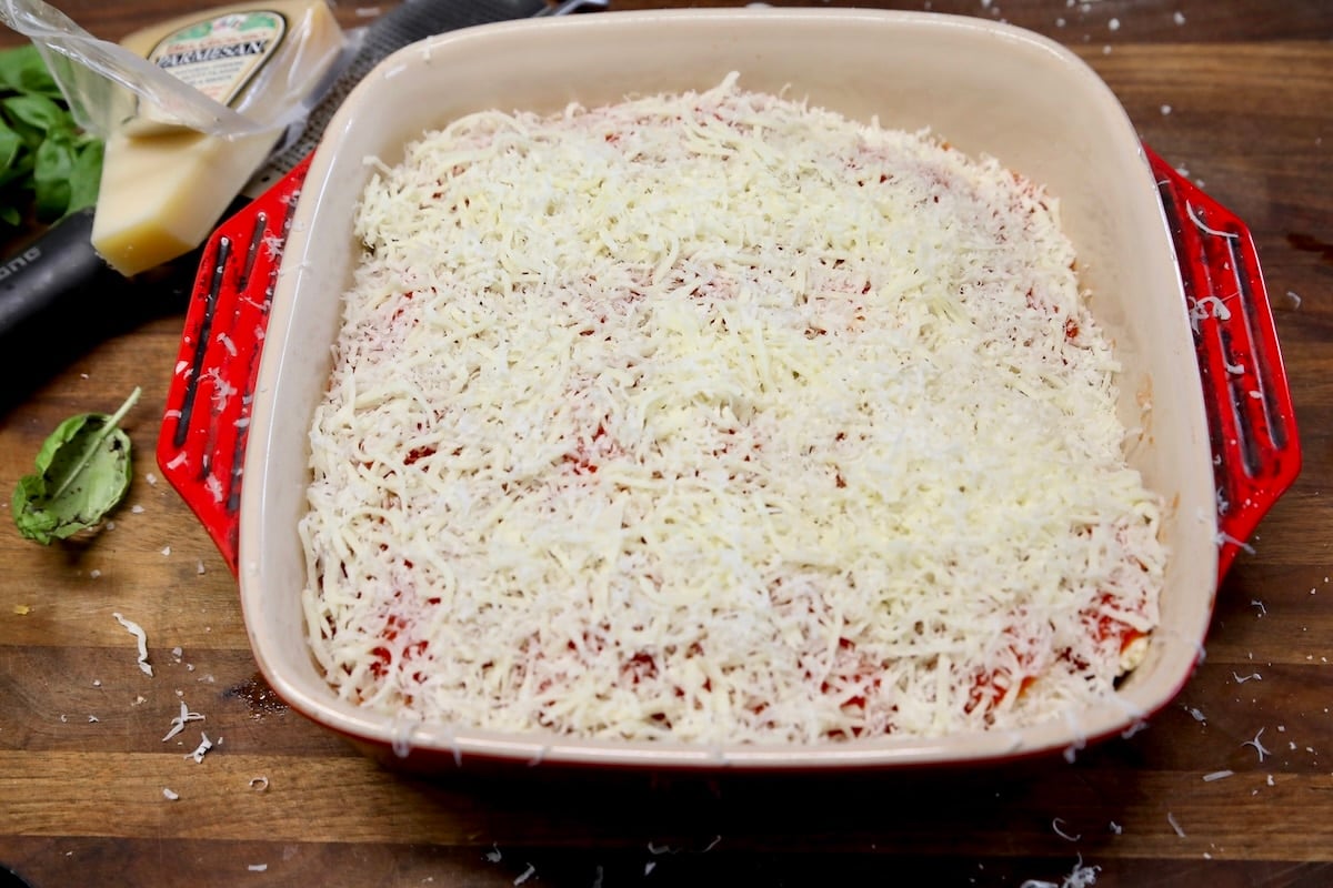 Ravioli Lasagna with shredded cheese.