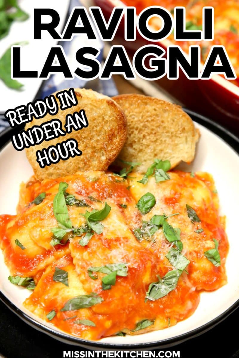 Ravioli lasagna plated with garlic bread- text overlay.