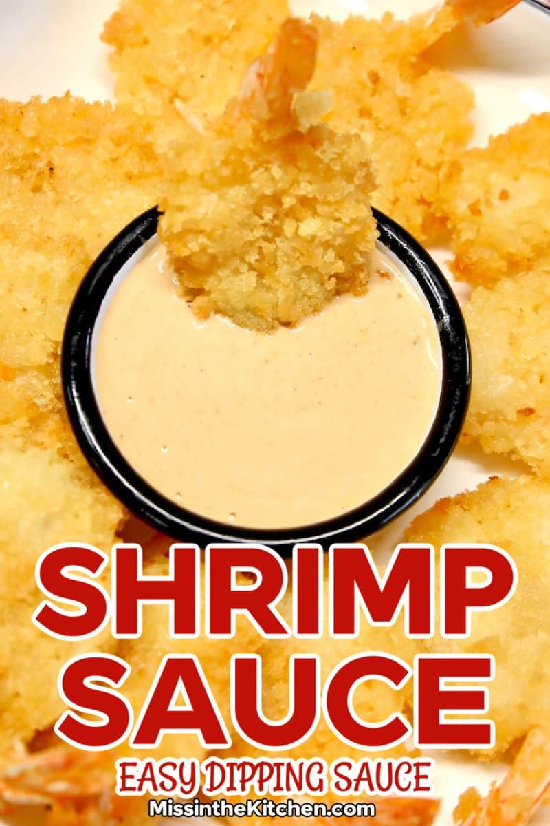 Shrimp sauce in a cup with shrimp dipping - text overlay.
