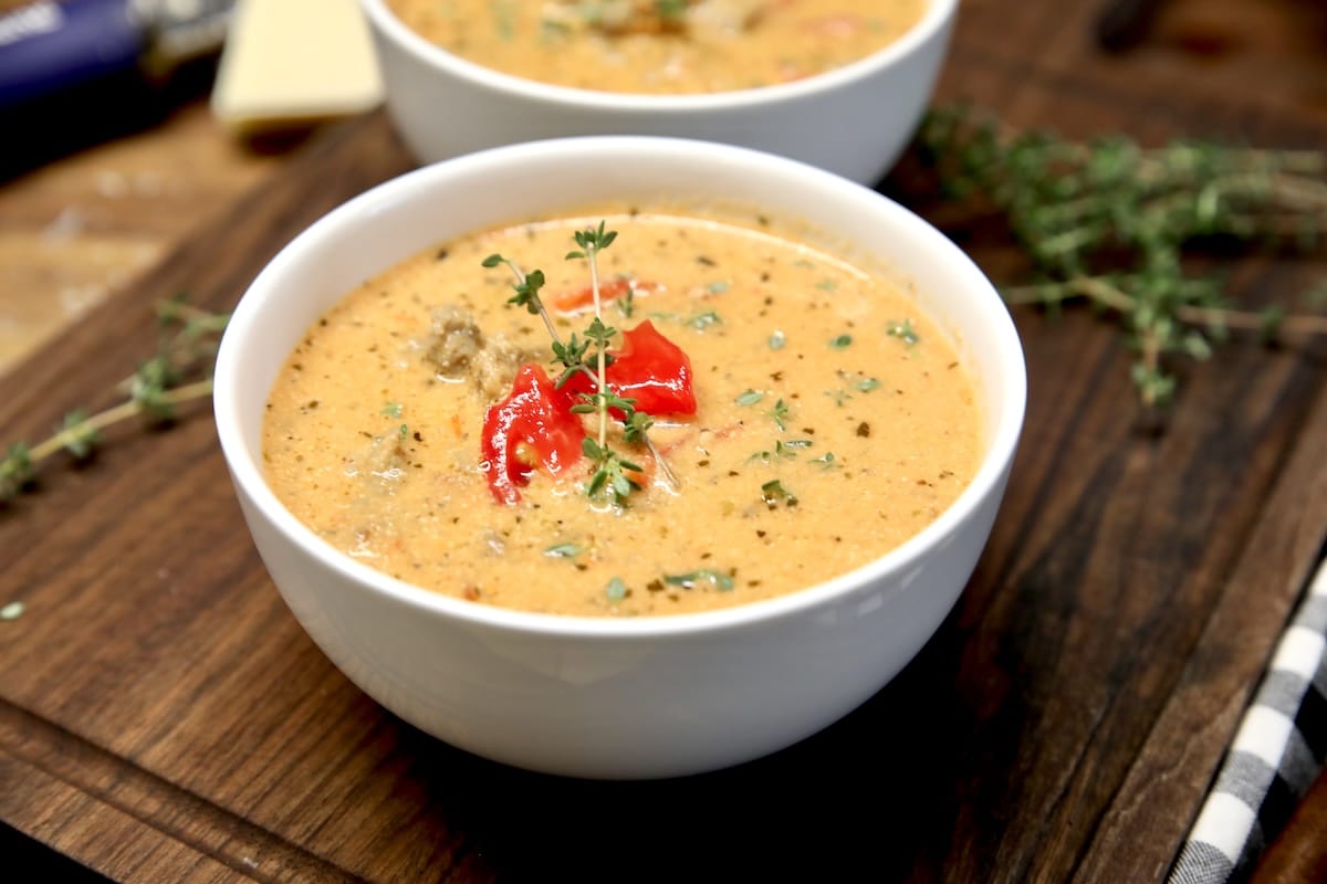Bowl of creamy tomato sausage soup.