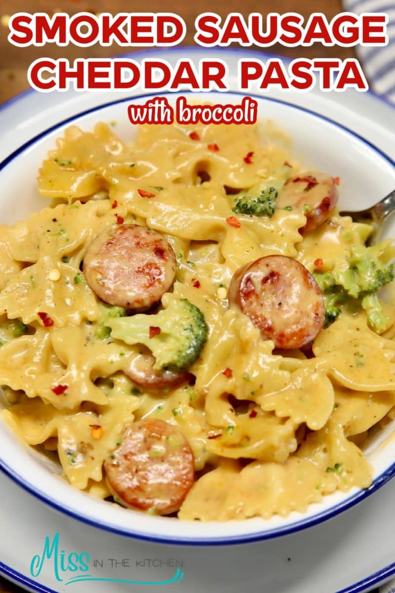 Smoked sausage pasta with broccoli and cheddar sauce.