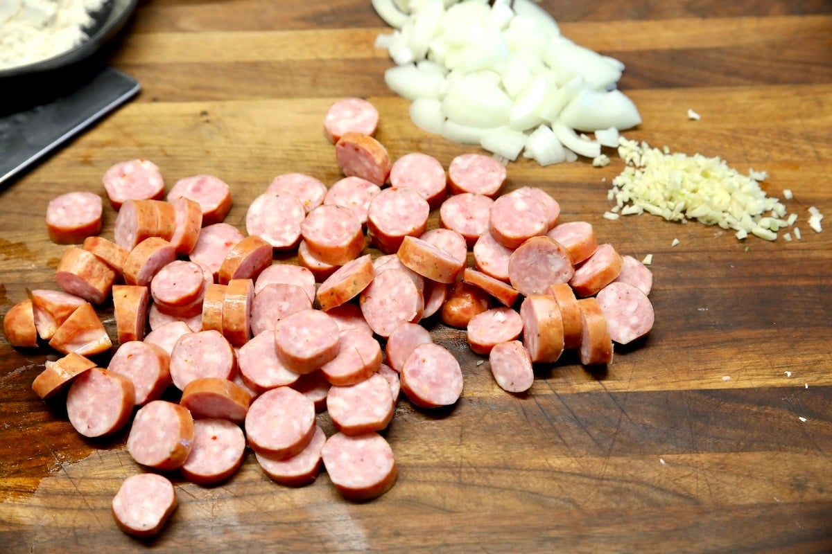 Sliced smoked sausage, sliced onion, minced garlic.